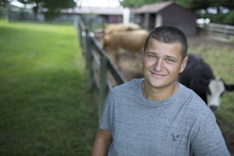 man with cows